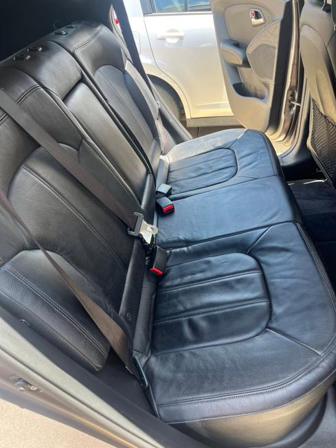 Messy car interior with food debris before and after full detail