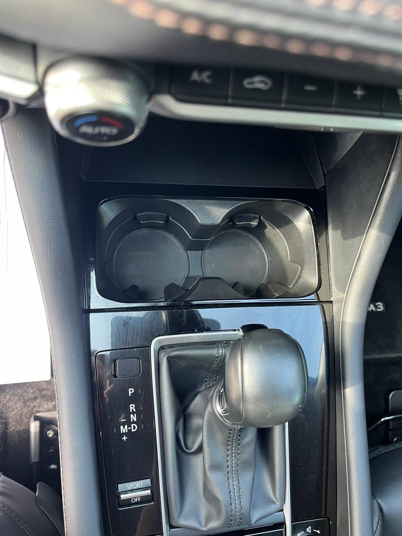 Detailed cup holder and console, example of TD'S Mobile Detailing work